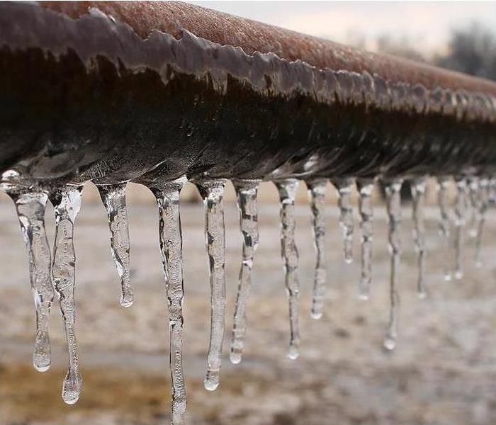 Icicles Hanging from a Frozen Pipe