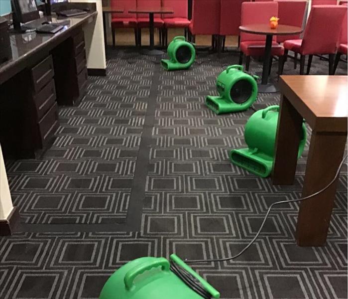 Air Movers set up in hotel lobby area 